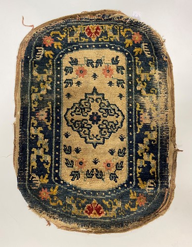 Lot 214 - A Tibetan top saddle rug, late 19th century