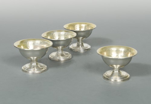 Lot 377 - A pair of George III 18th century silver pedestal salts, together with two similar examples