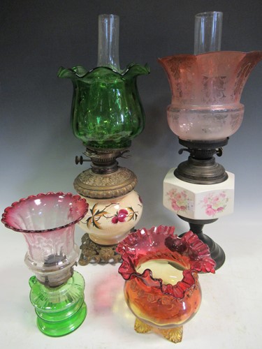 Lot 74 - Two Victorian oil lamps, with pottery...