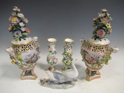 Lot 14 - A pair of Meissen style floral encrusted vases...