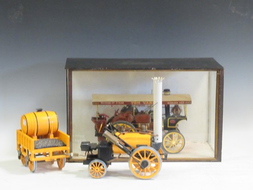 Lot 47 - A miniature steam engine in a glazed wooden...