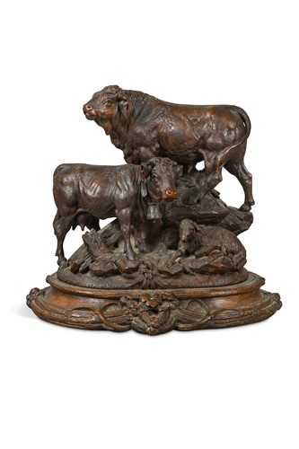 Lot 476 - A large Black Forest carved wood group of a bull, a cow and a sheep, attributed to Johan Huggler (1834-1913)