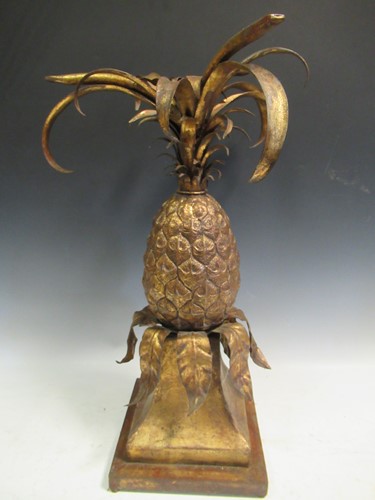 Lot 593 - A gilt metal glass table base modelled as a...