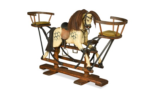 Lot 493 - A dapple grey painted wooden rocking horse, 20th century