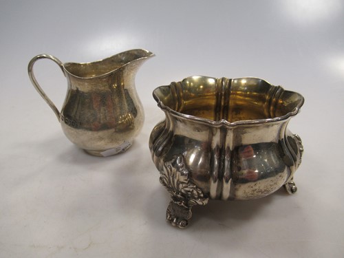 Lot 237 - A silver three footed sugar bowl and an...