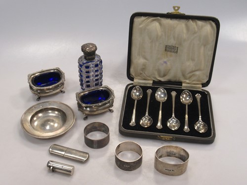 Lot 242 - A pair of silver salts, napkin rings, cased...
