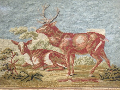Lot 393 - A 19th century needlework picture of deer, 20...