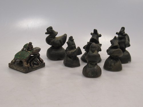 Lot 123 - Six bronze opium duck weights, probably...