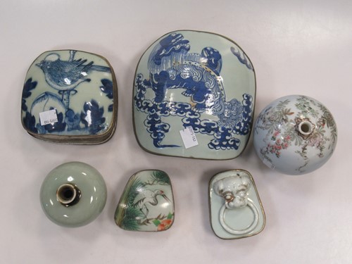 Lot 99 - Four Chinese porcelain-covered metal mounted...