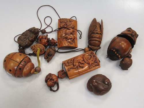 Lot 125 - Five modern Japanese carved wood animal shape...