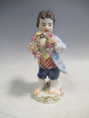 Lot 23 - A group of Meissen porcelain figures to...