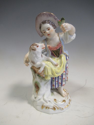 Lot 23 - A group of Meissen porcelain figures to...