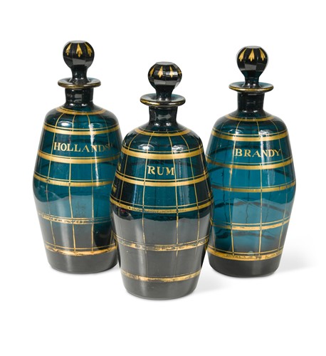 Lot 190 - A set of three Bristol green glass decanters and stoppers, circa 1790-1800