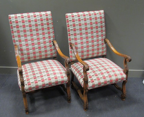 Lot 438 - A pair of oak elbow chairs in the 17th century...
