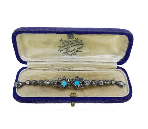 Lot 49 - A Georgian diamond and turquoise bar brooch