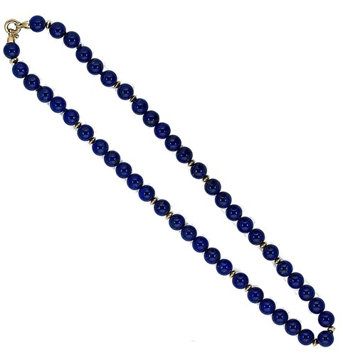 Lot 67 - A necklace of lapis lazuli beads