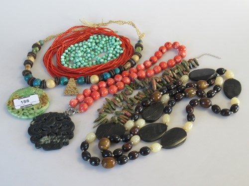 Lot 188 - A collection of bead jewellery and two medallions