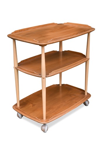 Lot 288 - An Ercol three-tier elm drinks trolley