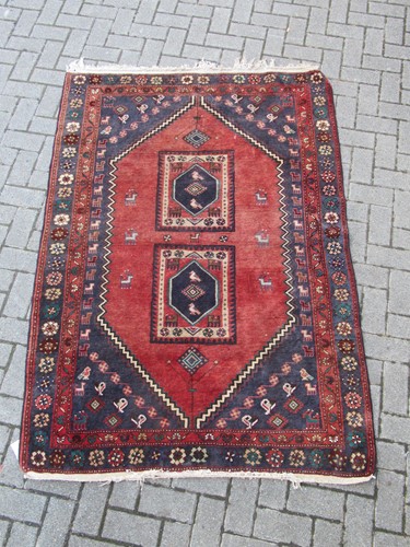 Lot 593 - A Gabbeh hand-knotted tribal rug 193 x 132cm