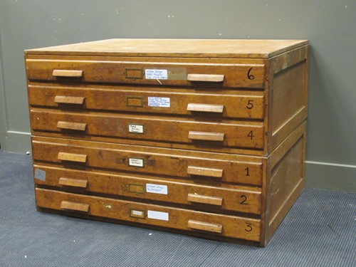 Lot 541 - A 20th century oak six drawer plan/ map chest...