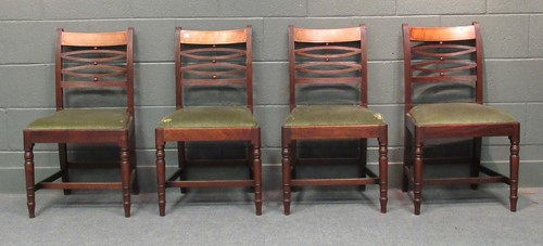Lot 579 - A set of four Regency mahogany dining chairs...