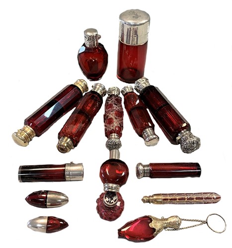 Lot 310 - A collection of Victorian and later red glass scent bottles