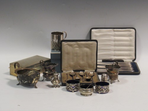 Lot 261 - A silver table cigarette box, a silver sauce...