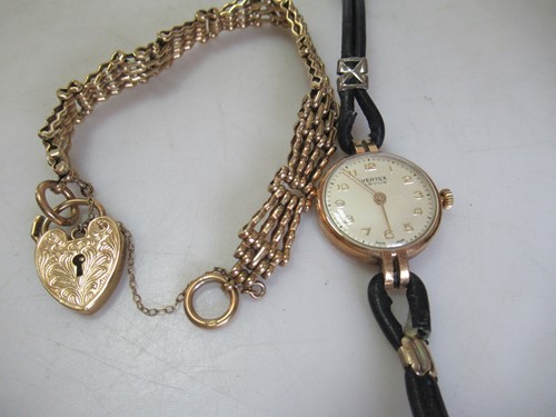 Lot 196 - A 9ct gold gate bracelet,16.6 grams together...