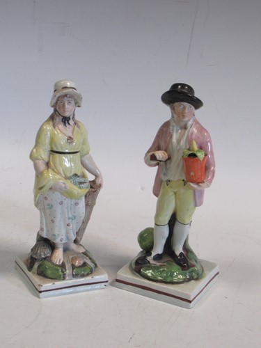 Lot 12 - Two Staffordshire pearlware figures of a...