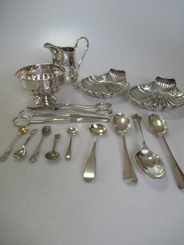 Lot 215 - A silver bowl, a silver jug, two pairs of...
