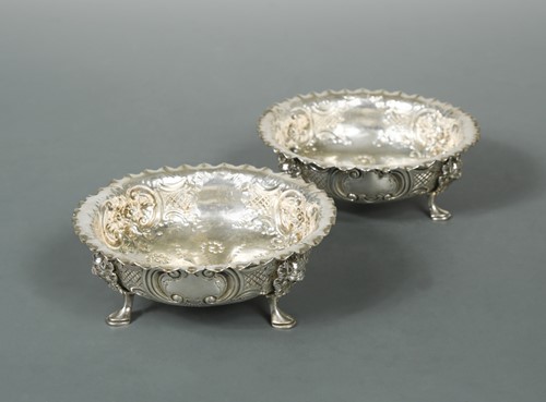 Lot 422 - A pair of Victorian silver bon bon dishes