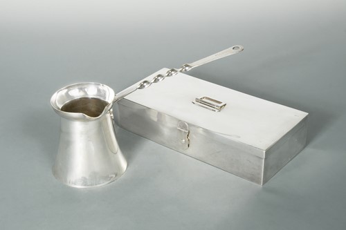 Lot 336 - A silver plated sandwich box, mark of Asprey, together with silver plated coffee pan