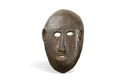 Lot 254 - A Magar wood mask, North Western Nepal, early 20th century