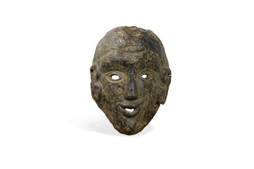Lot 269 - A carved, tree fungus mask, North Central Nepal, probably 19th century or earlier