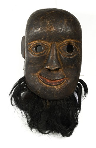 Lot 263 - A carved wood mask, Kasa Region, Nepal/ Tibet border, probably 19th century or earlier