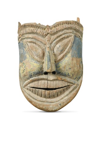 Lot 245 - A large carved wood Ravana Face, Terai Region, Southern Nepal, 19th century