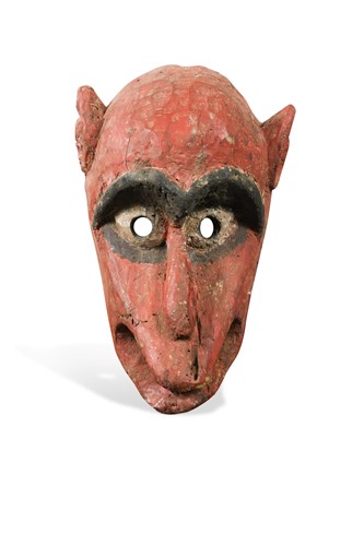 Lot 241 - A Rajbanshi carved wood Hanuman dancer's mask, Terai Region, Southern Nepal, 19th century