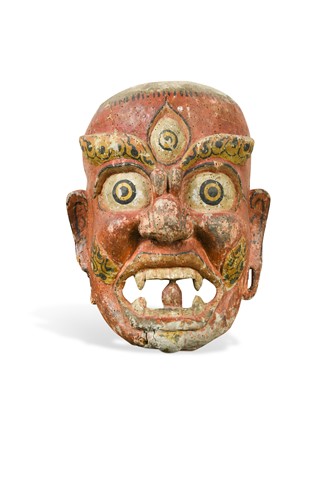 Lot 243 - A carved wood Lamaist Sungma mask, Southern Tibet, probably 18th/19th century