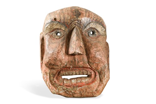 Lot 235 - A Tamang carved and painted wood comical mask, North Central Nepal, late 19th century