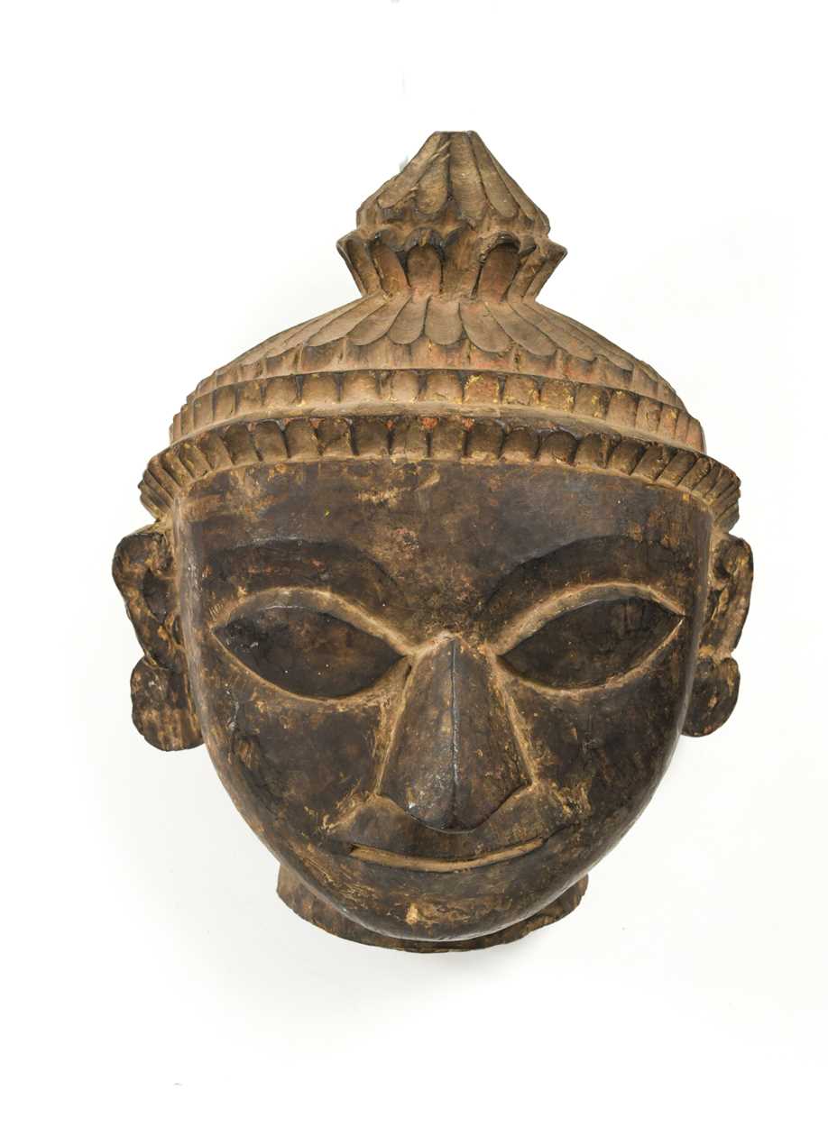 Lot 298 - A Tamang carved wood head of Buddha, Ganesh Himal Region or North Central Nepal, early 20th century