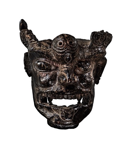 Lot 246 - A rare and important carved wood mask of Krodha, Southern Tibet, carbon dated AD1430-AD1620