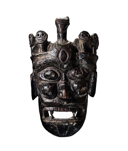 Lot 247 - A rare and important carved wood mask of Krodha, Southern Tibet