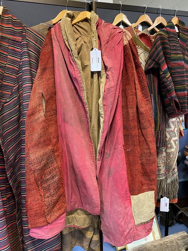 Lot 185 - A rare red wool Lama's meditation cape, Tibet, 19th century