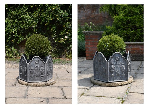 Lot 542 - A pair of hexagonal lead planters, 20th century