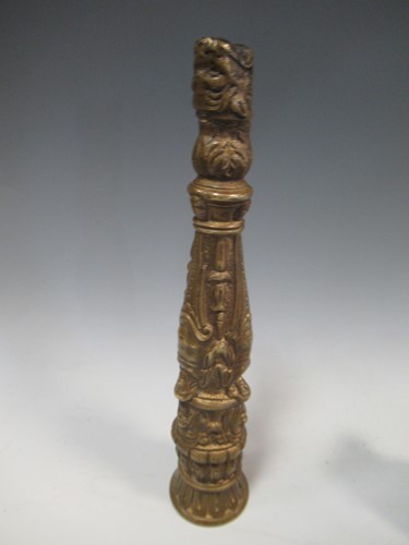 Lot 191 - A handle from a pair of bellows, cast with...