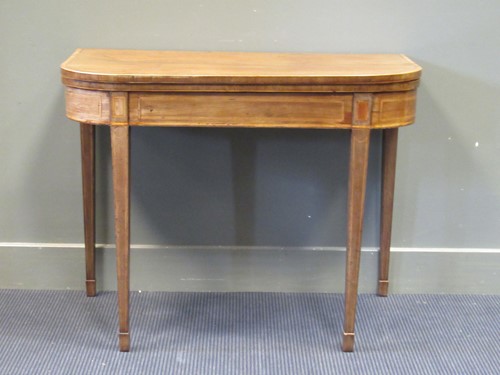 Lot 508 - A George III inlaid mahogany card table on...