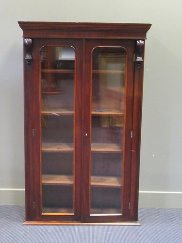 Lot 512 - A Victorian glazed two door cabinet with four...