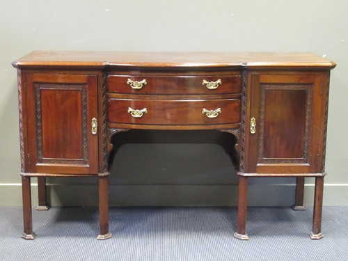 Lot 505 - A Chippendale style mahogany sideboard, circa...