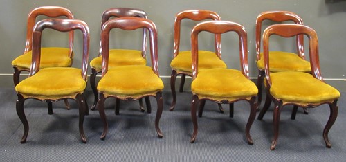 Lot 458 - A set of eight late 19th century walnut dining...
