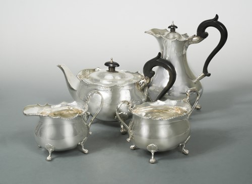 Lot 472 - A George VI silver four-piece tea set